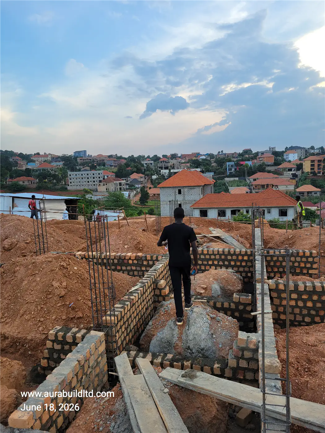 Column reinforcement steel bars and footing preparation at Nsasa-Kira