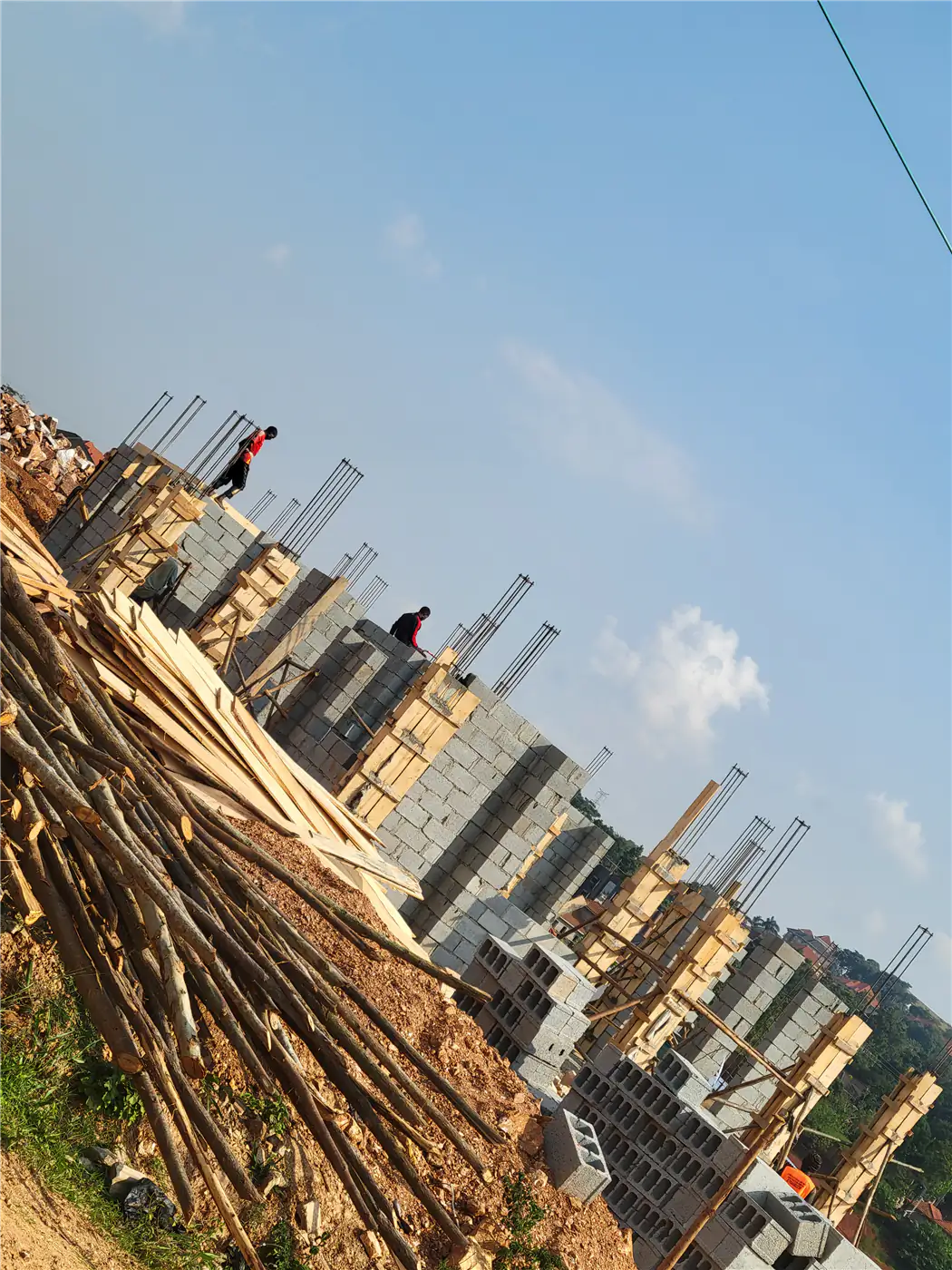 Formwork assembly for vertical columns and structural beams at Nsasa-Kira